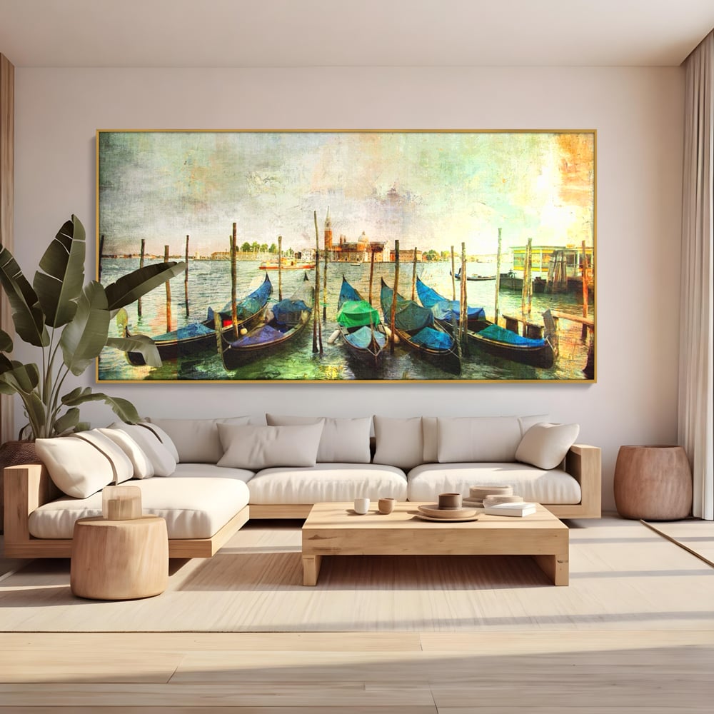 Tablou canvas cu pictura orizontala cu gondole in venetia, in rama de aluminiu auriu, pe perete intr-un living